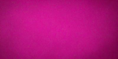 The primary subject of the image is a large, pink wall. The setting is a room with a pink background, and the visual style is a close-up of the wall. The dominant colors in the image are pink, and the overall atmosphere is bright and vibrant.