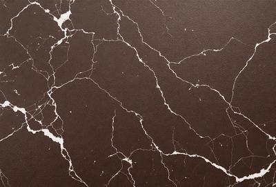 The primary subject of the image is a close-up of a marble wall with a brown and black color scheme. The setting is a room with a brown leather wall, which adds to the overall atmosphere. The visual style is a photo, capturing the intricate details of the marble wall. The colors and mood of the image are rich and sophisticated, with the brown and black tones creating a sense of elegance and luxury.