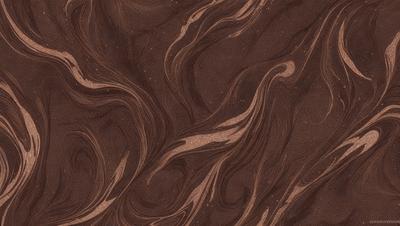 The primary subject of the image is a brown and white patterned surface, which appears to be a textured wallpaper or a piece of fabric. The setting is indoors, with the patterned surface covering a significant portion of the background. The visual style of the image is a close-up, focusing on the intricate details of the pattern. The colors in the image are predominantly brown and white, creating a warm and earthy atmosphere.