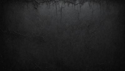 The primary subject of the image is a black background with a texture that resembles a leather surface. The setting is a dark room, and the visual style appears to be a close-up of the leather surface. The colors and mood of the image are predominantly dark and moody, with the black background and leather texture creating a dramatic and intense atmosphere.