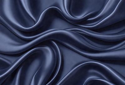 The primary subject of the image is a blue fabric, which appears to be a piece of cloth or a curtain. The setting is a room with a blue wall, and the visual style is a close-up of the blue fabric. The colors and mood of the image are predominantly blue, creating a calm and serene atmosphere.