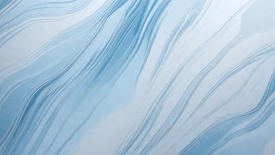 The primary subject of the image is a blue and white ocean wave. The setting is the ocean, with the wave being the main focus of the image. The visual style is a photo of the ocean, capturing the beauty of the wave. The dominant colors are blue and white, creating a serene and calming atmosphere.