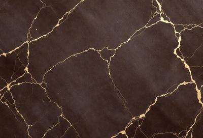 The primary subject of the image is a close-up of a marble wall with a gold-colored pattern. The setting is a room with a dark background, which contrasts with the gold and brown colors of the marble wall. The visual style is a combination of a photo and a digital art, creating a unique and intricate pattern on the marble surface. The colors and mood of the image are warm and luxurious, evoking a sense of sophistication and elegance.