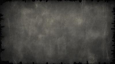 The primary subject of the image is a large, gray, textured surface. The setting is a room with a gray wall, and the visual style is a combination of a photo and a drawing. The colors and mood of the image are predominantly gray, creating a somewhat moody atmosphere.
