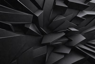 The primary subject of the image is a black and white photo of a wall with a pattern of triangles. The setting is a black background, and the visual style is a close-up of the wall pattern. The dominant colors are black and white, creating a stark and minimalist atmosphere.