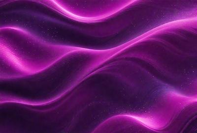 The primary subject of the image is a purple, pink, and blue swirling pattern. The setting is a purple background, and the visual style appears to be a digital art or illustration. The dominant colors in the image are purple, pink, and blue, creating a vibrant and lively atmosphere.