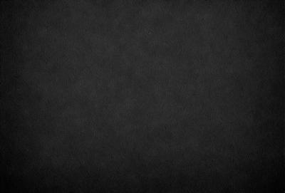The primary subject of the image is a black background with a few white stars. The setting is a dark, starry sky, and the visual style is a black and white photo. The colors and mood of the image are predominantly dark and moody, with the white stars providing a touch of brightness.