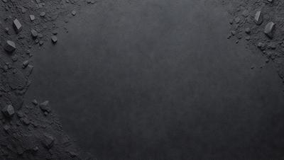 The primary subject of the image is a large, dark gray surface, which appears to be a stone or concrete wall. The setting is a dark room, and the visual style is a close-up of the wall. The colors and mood of the image are predominantly dark and moody, with the gray surface creating a sense of depth and mystery.