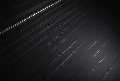 The primary subject of the image is a black background with a pattern of white lines. The setting is a dark room, and the visual style appears to be a digital art or illustration. The dominant colors are black and white, creating a moody and dramatic atmosphere.