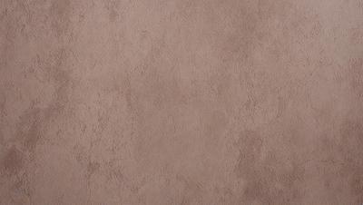 The image features a large, unfinished wall with a brown, textured surface. The wall appears to be made of cement or a similar material. The setting is a plain, empty room with no other objects or decorations visible. The visual style is a close-up of the wall, showcasing its texture and color. The dominant colors are brown and beige, giving the wall a natural and earthy appearance.
