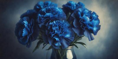 The primary subject of the image is a vase filled with blue flowers. The setting is a room with a blue background, and the visual style is a photo. The dominant colors in the image are blue and white, creating a calm and serene atmosphere.