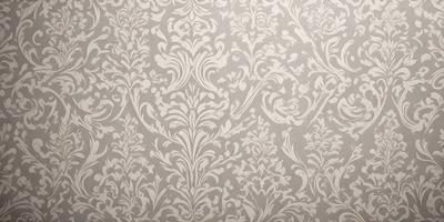 The primary subject of the image is a wallpaper with a floral pattern. The setting is a room with a white wall, and the visual style is a patterned wallpaper. The colors and mood of the image are predominantly white, giving it a clean and elegant appearance.