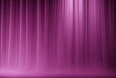 The primary subject of the image is a pink curtain, which is the main object, scene, or focus of the image. The setting/background consists of a stage with a purple curtain, and the visual style is a photo. The colors and mood of the image are predominantly pink, creating a warm and inviting atmosphere.