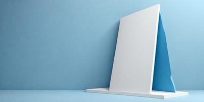 The primary subject of the image is a white piece of paper, which is the main object in the scene. The paper is placed on a blue surface, creating a contrast between the white paper and the blue background. The visual style of the image is a photo, capturing the paper in its natural form. The colors and mood of the image are predominantly blue and calm, with the white paper standing out against the blue background.