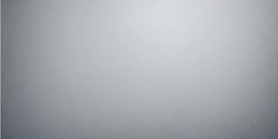 The image is a white canvas with a gray background. The primary subject is a large, empty space with no visible objects or details. The setting is a plain, empty room with no visible walls or other elements. The visual style is minimalistic, with a focus on the white and gray tones. The colors and mood are calm and serene, with a sense of emptiness and simplicity.