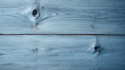 The primary subject of the image is a wooden wall with a blue color. The setting is a room with a wooden surface, and the visual style is a photo. The dominant colors are blue and brown, creating a calm and natural atmosphere.