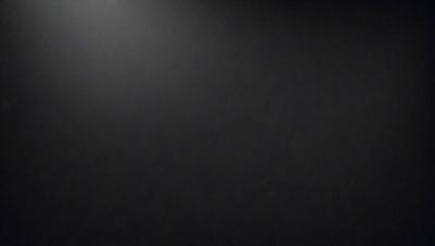 The primary subject of the image is a black background with a few white stars scattered across it. The setting appears to be a night sky, and the visual style is a combination of a photo and a drawing. The colors are predominantly black and white, creating a dark and moody atmosphere.