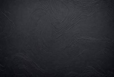The primary subject of the image is a black background with a pattern of swirls and waves. The setting is a dark room, and the visual style appears to be a combination of a photo and a digital art or illustration. The dominant colors are black and grey, creating a moody atmosphere.