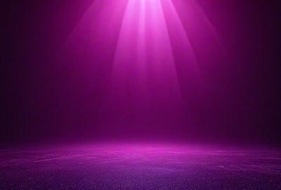 The primary subject of the image is a purple light, which is illuminating a dark room. The setting is a dark room with a purple light source, creating a moody atmosphere. The visual style is a close-up of the purple light, emphasizing its brightness and intensity. The colors and mood of the image are predominantly purple, with the light source creating a dramatic and atmospheric scene.