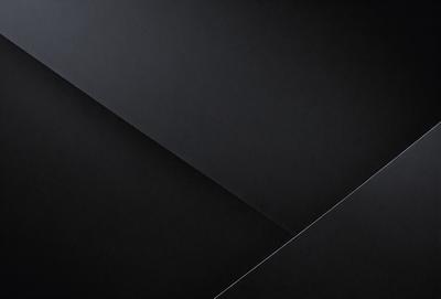 The primary subject of the image is a black triangle. The setting is a black background, and the visual style appears to be a digital art or illustration. The dominant colors are black and white, creating a bold and striking appearance. The overall atmosphere of the image is modern and minimalistic.