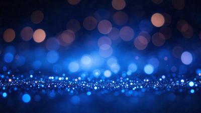 The primary subject of the image is a blue background with a pattern of bright lights. The setting appears to be a nighttime scene, with the lights creating a visually striking and luminous atmosphere. The visual style of the image is a combination of a photo and digital art, as the bright lights create a unique and artistic effect. The colors and mood of the image are predominantly blue, with the bright lights adding a sense of energy and dynamism to the scene.