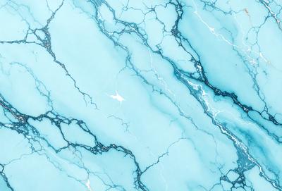 The primary subject of the image is a blue and white marble wall with a pattern of white and blue veins. The setting is a room with a blue and white marble floor. The visual style is a photo of the marble wall and floor. The colors and mood of the image are predominantly blue and white, creating a serene and elegant atmosphere.
