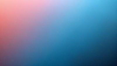 The primary subject of the image is a blue and pink background. The setting is a blue and pink sky, which creates a vibrant and colorful atmosphere. The visual style of the image is a photo, capturing the vivid colors and the sky's beauty. The colors and mood of the image are predominantly blue and pink, evoking a sense of calmness and serenity.