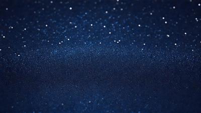 The primary subject of the image is the night sky, which is filled with a multitude of stars. The setting is a dark, starry night, with the stars being the main focus of the image. The visual style is a photo, capturing the beauty of the night sky. The colors and mood of the image are predominantly dark and serene, with the stars providing a sense of wonder and tranquility.