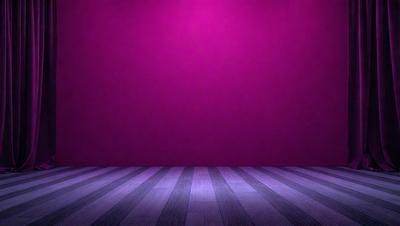 The primary subject of the image is a purple wall. The setting is a room with a purple wall, and the visual style is a photo. The dominant colors are purple and pink, creating a calm and soothing atmosphere.