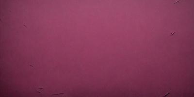 The primary subject of the image is a large, pink wall. The setting is a room with a pink background, and the visual style is a close-up of the wall. The dominant colors in the image are pink, and the overall atmosphere is warm and inviting.