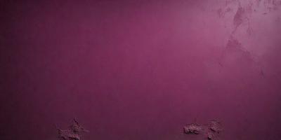 The primary subject of the image is a purple wall. The setting is a room with a purple wall, and the visual style is a photo. The dominant colors are purple and red, creating a warm and inviting atmosphere.