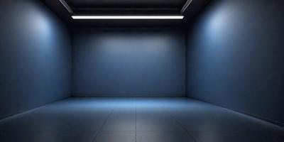 The primary subject of the image is a large, empty room with a blue wall. The setting is a dark room with a blue wall, and the visual style is a photo. The colors and mood of the image are predominantly blue, creating a calm and serene atmosphere.