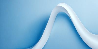 The primary subject of the image is a white, curved ribbon or wave, which is the main focus of the image. The ribbon is displayed against a blue background, creating a visually striking contrast. The visual style of the image is a combination of photo and digital art, as it appears to be a photograph of a digital artwork. The overall atmosphere of the image is dynamic and eye-catching, with the white ribbon or wave taking center stage.