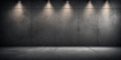 The primary subject of the image is a large, empty room with a cement wall. The setting is a dark room with a single light source, creating a moody atmosphere. The visual style is a black and white photo, which adds to the dramatic and artistic feel of the scene. The colors and mood are predominantly dark and somber, with the light source being the only source of illumination in the room.
