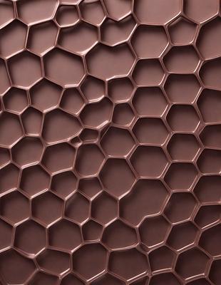 The primary subject of the image is a close-up of a brown, textured surface. The setting appears to be a wall or a patterned surface, possibly made of metal or a similar material. The visual style of the image is a close-up, which emphasizes the intricate details of the surface. The colors in the image are predominantly brown, giving the scene a warm and earthy atmosphere.