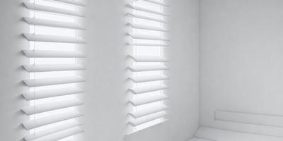 The primary subject of the image is a white wall with a row of white blinds. The setting is a room with a white wall, and the visual style is a photo. The colors and mood of the image are predominantly white, creating a clean and minimalist atmosphere.