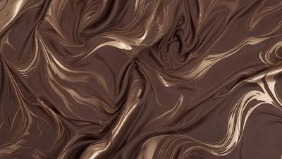 The primary subject of the image is a brown fabric with a pattern of gold and brown swirls. The setting is a close-up of the fabric, showcasing its intricate design. The visual style is a combination of a photo and digital art, as the fabric appears to be a blend of natural and artificial elements. The colors and mood of the image are warm and earthy, with the gold and brown tones creating a sense of richness and depth.