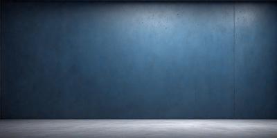 The primary subject of the image is a blue wall with a cement texture. The setting is a room with a blue wall, and the visual style is a photo. The dominant colors are blue and grey, creating a calm and serene atmosphere.