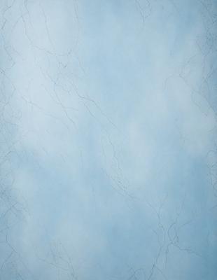The primary subject of the image is a blue wall with a white texture. The setting is a room with a blue background. The visual style is a close-up of the wall, showcasing the texture and color. The colors and mood of the image are predominantly blue and white, creating a calm and serene atmosphere.