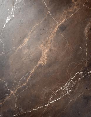 The image features a marble countertop with a brown and white pattern. The countertop appears to be made of marble, giving it a luxurious and elegant appearance. The pattern on the countertop adds visual interest and depth to the surface.