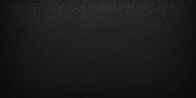 The primary subject of the image is a black background with a few white stars scattered across it. The setting is a dark, starry sky, and the visual style is a combination of a photo and a digital artwork. The colors are predominantly black and white, creating a moody and dramatic atmosphere.