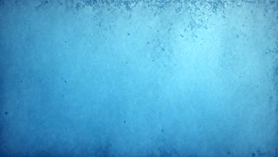 The primary subject of the image is a large, blue, textured surface. The setting is a blue background, and the visual style appears to be a photo. The dominant colors are blue and white, creating a calm and serene atmosphere.