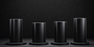 The primary subject of the image is a group of three black cylindrical objects, which are placed on a black surface. The setting is a dark room, and the visual style appears to be a photo. The colors and mood of the image are predominantly dark and moody, with the black objects contrasting against the black background.