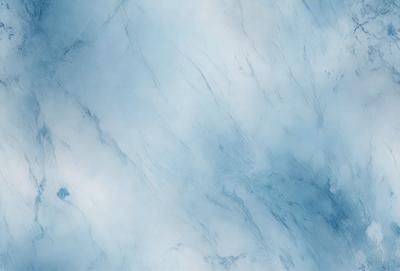 The primary subject of the image is a marble-like surface, which appears to be a blue marble wall. The setting is a cloudy sky, creating a moody atmosphere. The visual style is a close-up of the marble wall, showcasing its texture and details. The colors and mood of the image are predominantly blue, with the marble wall and the cloudy sky contributing to a calm and serene ambiance.