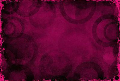 The primary subject of the image is a red background with a pattern of circles. The setting is a close-up of the red background, which creates a visually striking and bold appearance. The visual style is a combination of a pattern and a texture, giving the image a unique and artistic feel. The dominant colors are red and pink, creating a warm and vibrant atmosphere.