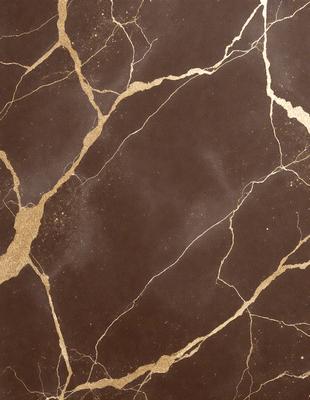 The primary subject of the image is a marble surface with a gold-like pattern. The setting is a room with a brown background. The visual style is a close-up of the marble surface, showcasing its intricate design. The colors and mood of the image are warm and elegant, with the gold pattern adding a touch of luxury to the marble surface.