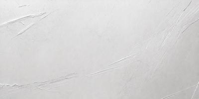 The primary subject of the image is a white wall with a few streaks of paint on it. The setting is a room with a white background. The visual style is a close-up of the wall, showcasing the paint streaks. The colors and mood of the image are predominantly white, giving it a clean and minimalist appearance.