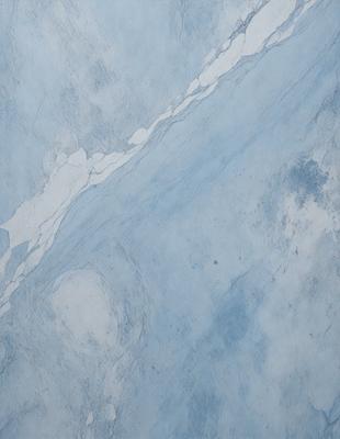 The primary subject of the image is a blue marble wall with a white and blue pattern. The setting is a room with a blue and white marble wall. The visual style is a photo of the marble wall. The dominant colors are blue and white, creating a calm and serene atmosphere.