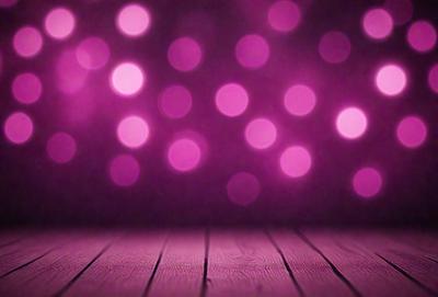 The primary subject of the image is a pink background with a purple hue. The setting is a dark room, and the visual style is a digital art or illustration. The dominant colors and overall atmosphere are pink and purple, creating a warm and inviting ambiance.