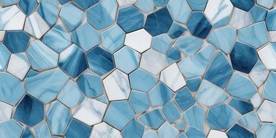 The primary subject of the image is a blue and white tile pattern. The setting is a wall with a blue and white tile design. The visual style is a close-up of the tile pattern, showcasing the intricate details of the blue and white tiles. The colors and mood of the image are predominantly blue and white, creating a clean and elegant atmosphere.